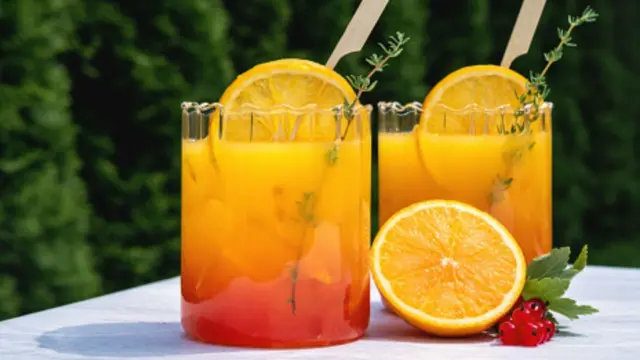 Cups of orange juice